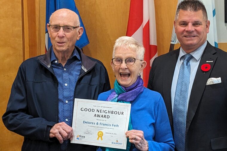 Good Neighbour winners Delores and Francis Feth pose with Mayor Daneluik at City Hall.