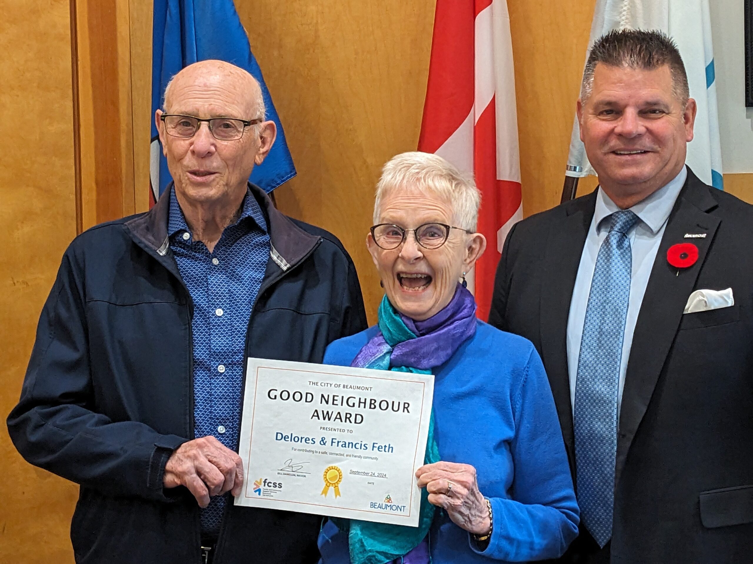 Good Neighbour winners Delores and Francis Feth pose with Mayor Daneluik at City Hall.