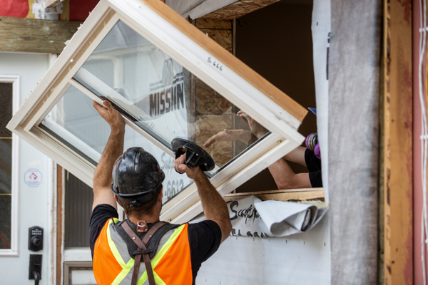 Man installing new windows